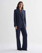 Roman Double Breasted Jacket in Petrol Blue pure wool, menswear-informed tailored blazer and matching trousers on a female model