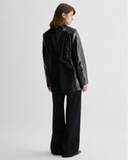 Black Veronica De Piante Jess jacket in shiny patent leather, stylish coat with a sleek, modern design.