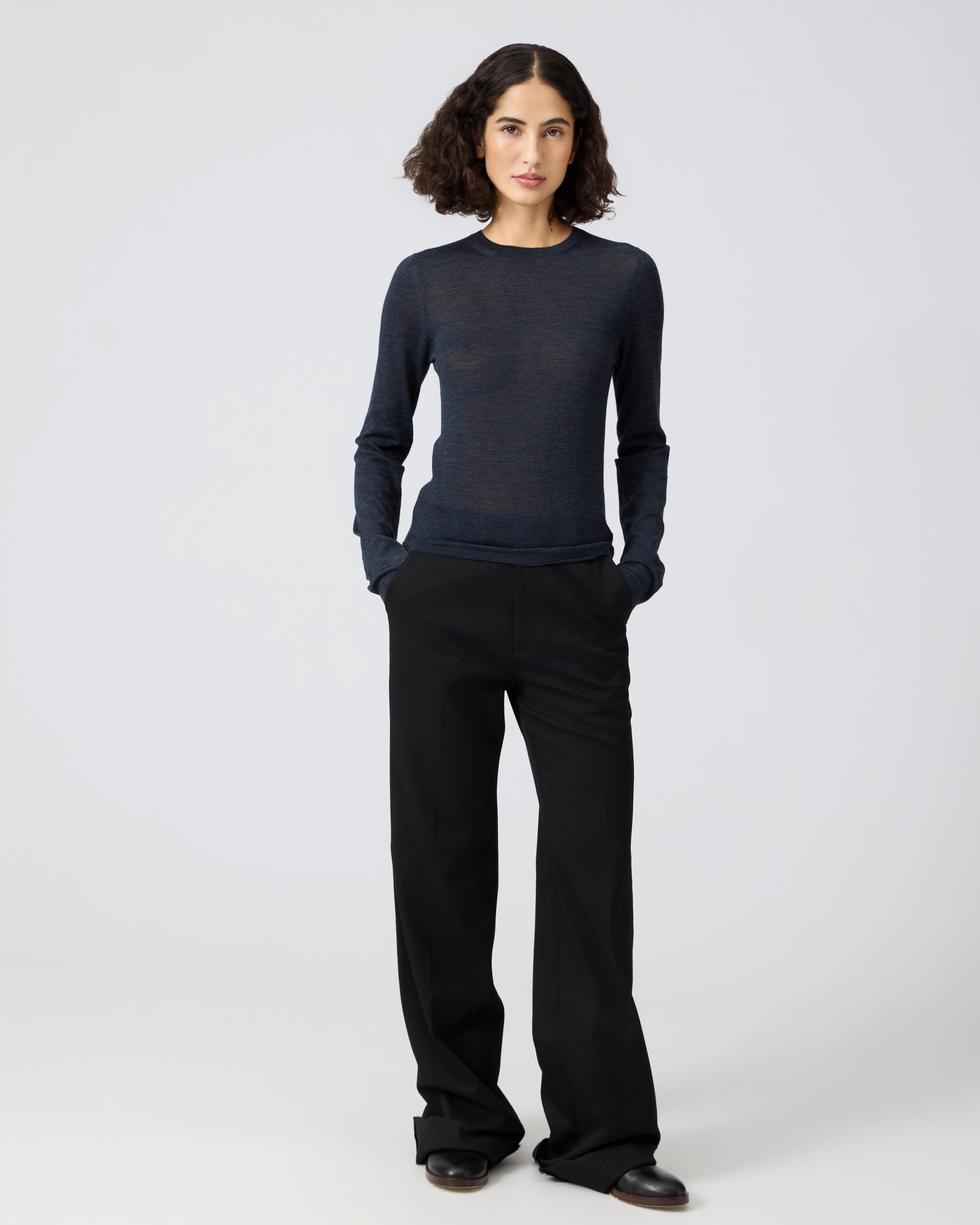 Veronica De Piante Joey Blue Sweater in superfine merino knitwear, showing a close-up of the textured blue fabric.