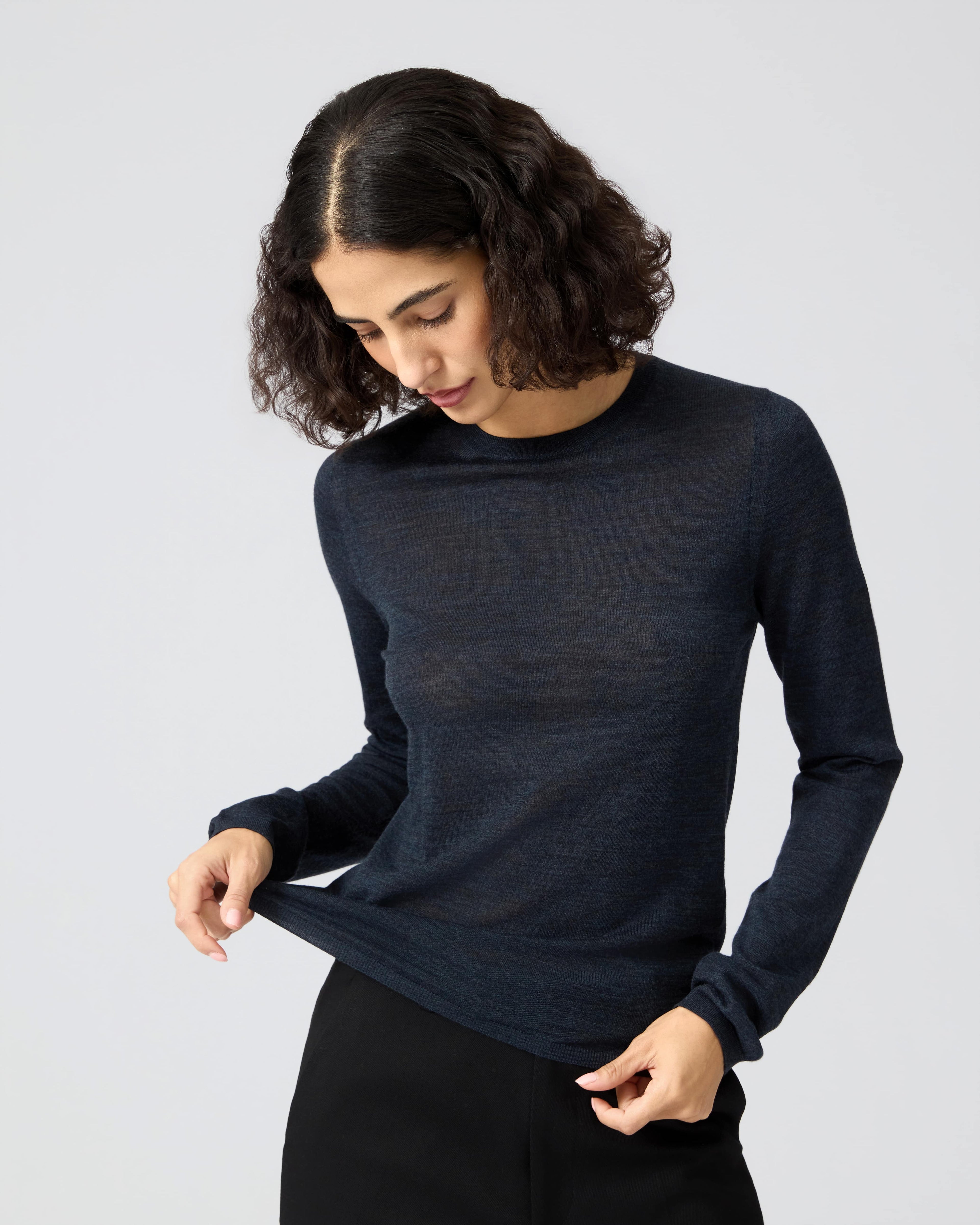 Blue Joey Sweater in superfine merino knitwear by Veronica De Piante, showcasing a cozy, stylish sweater with a textured knit pattern.