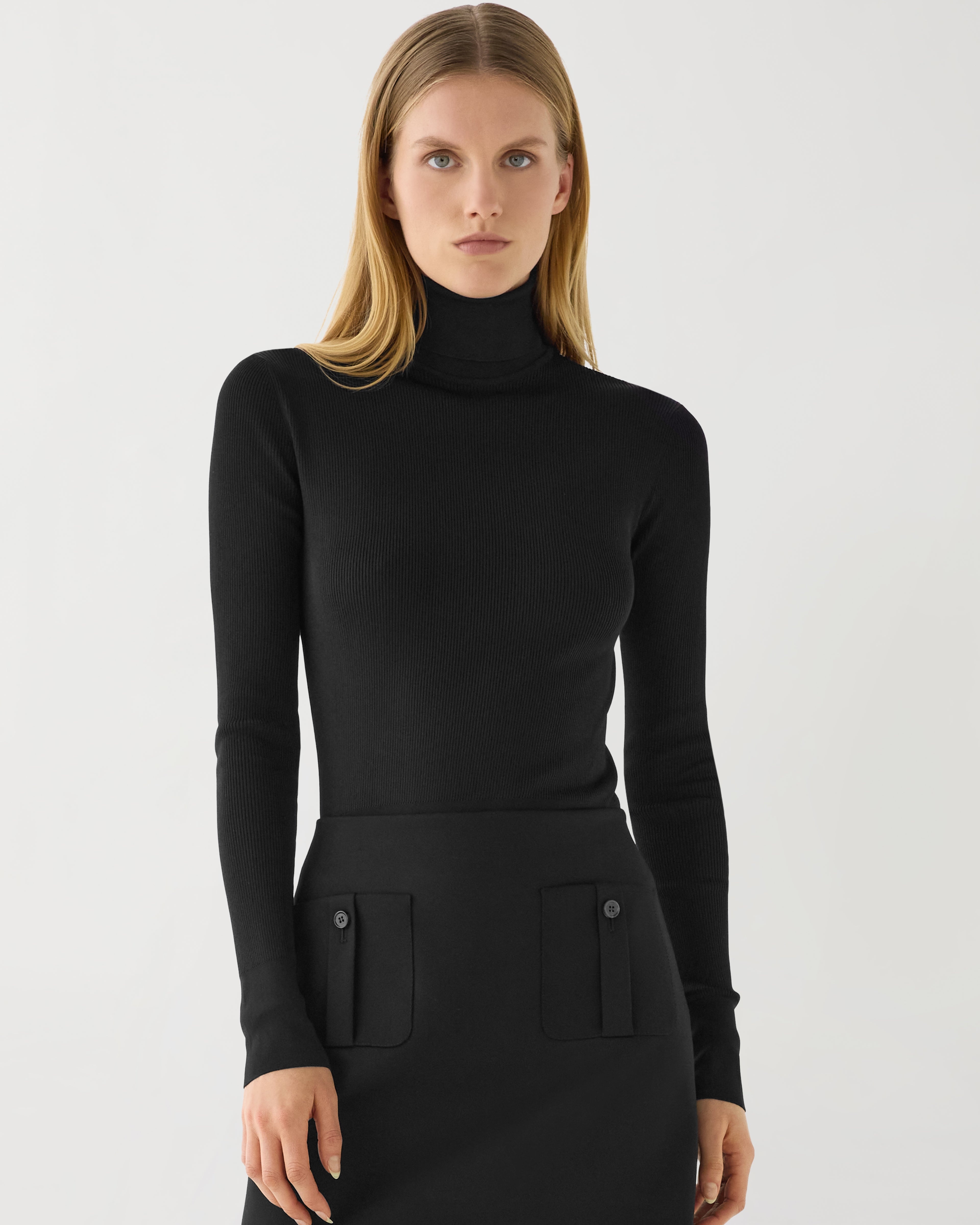 Black silk knit Evanne turtleneck sweater from SALE, featuring a soft texture and elegant fit.