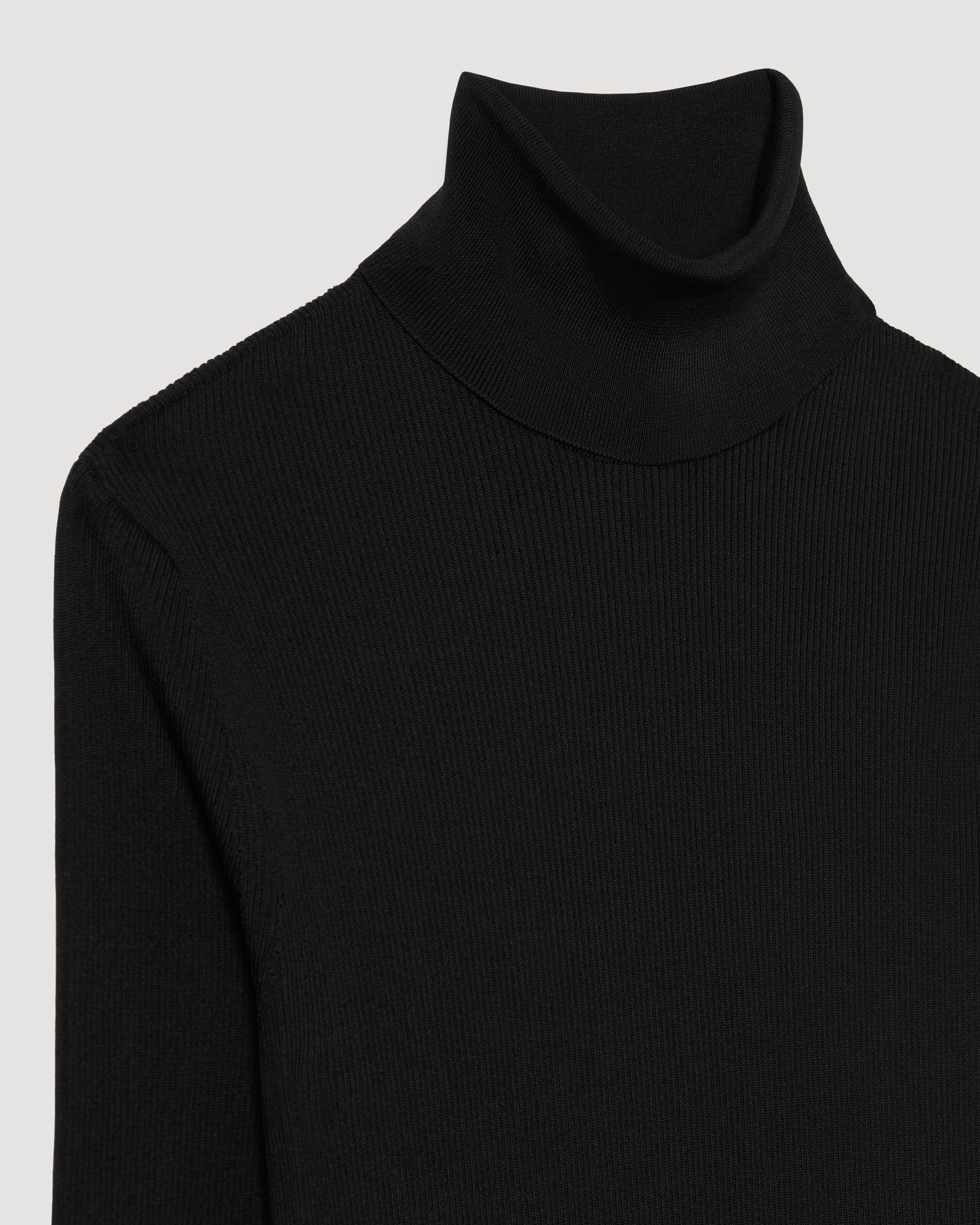 Black silk knit Evanne turtleneck sweater by SALE, showcasing a soft texture and elegant design.