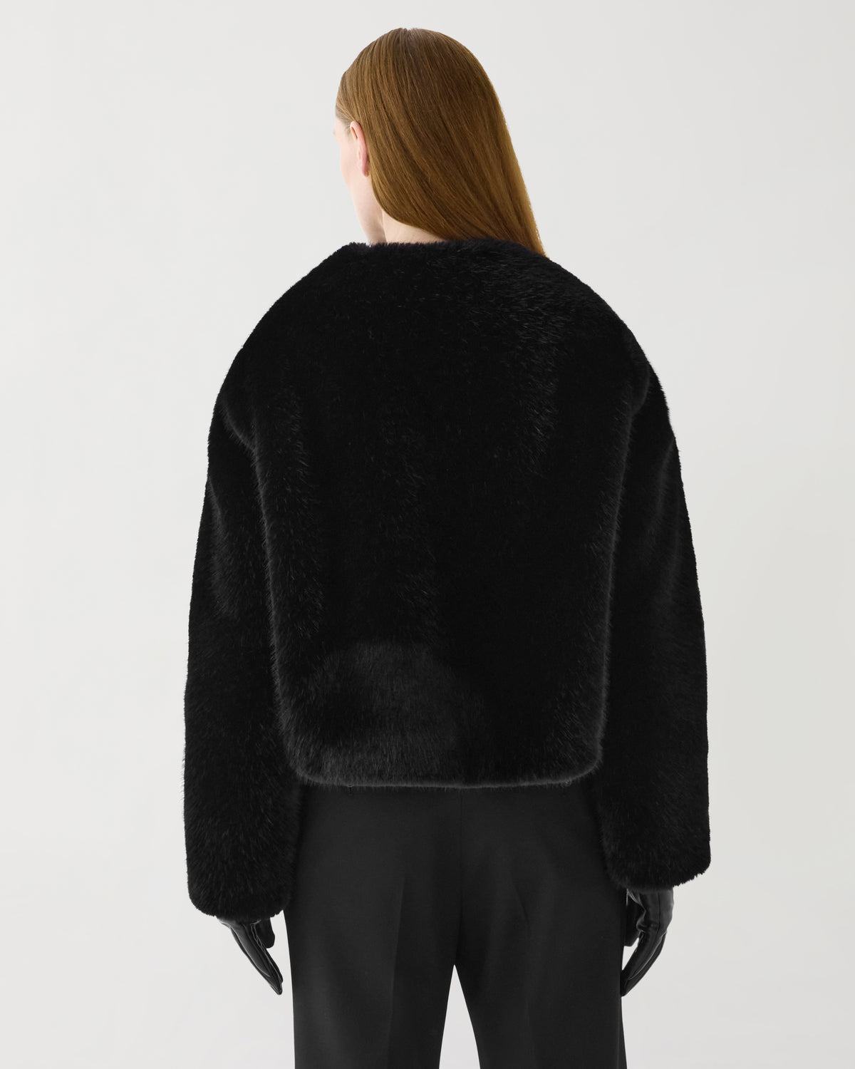 Black Sadie luxury cropped faux fur jacket, plush texture, boxy silhouette, women's outerwear, back view