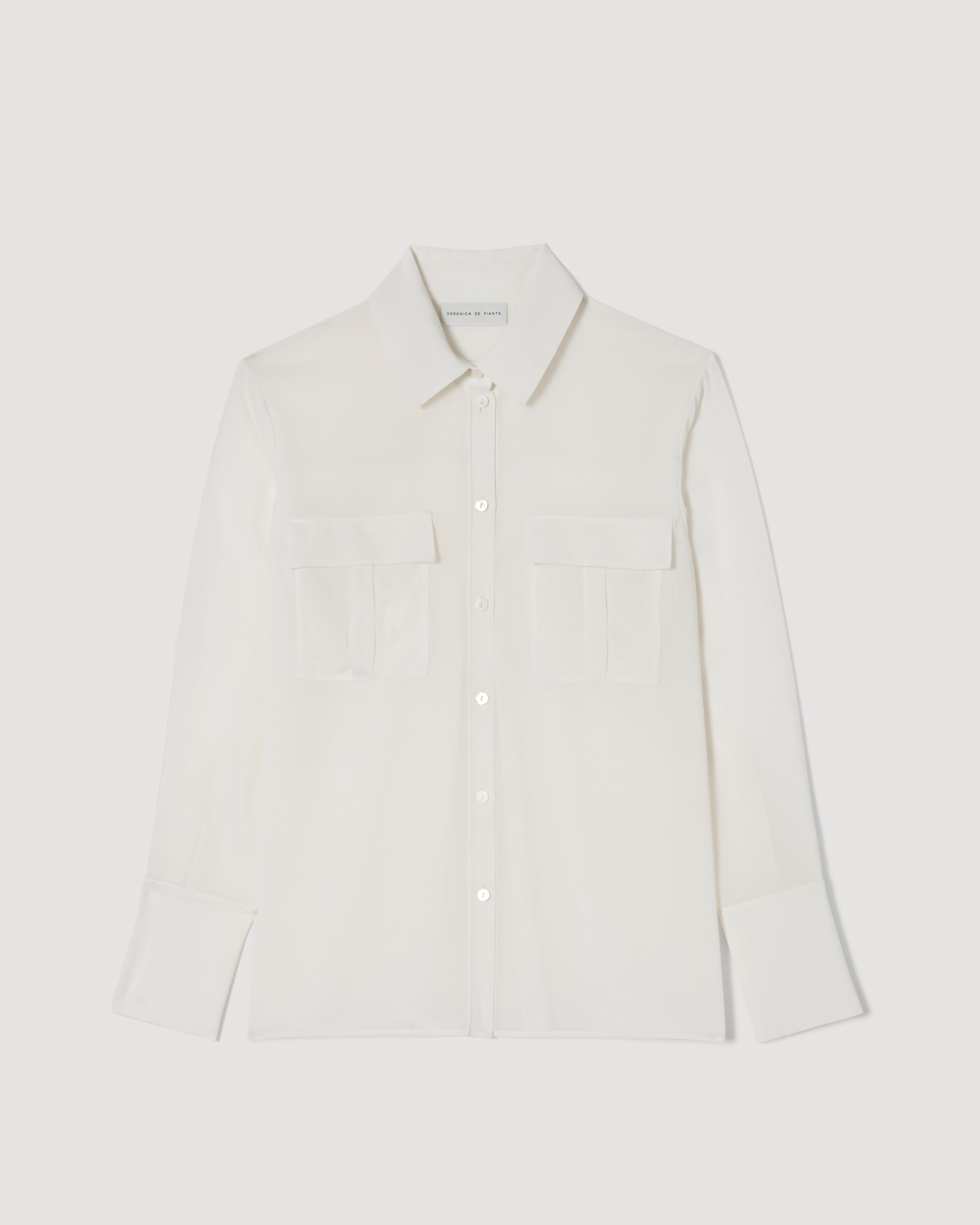 Off-white Jamie Shirt in lightweight wool voile, featuring long sleeves and a relaxed fit, by SALE.