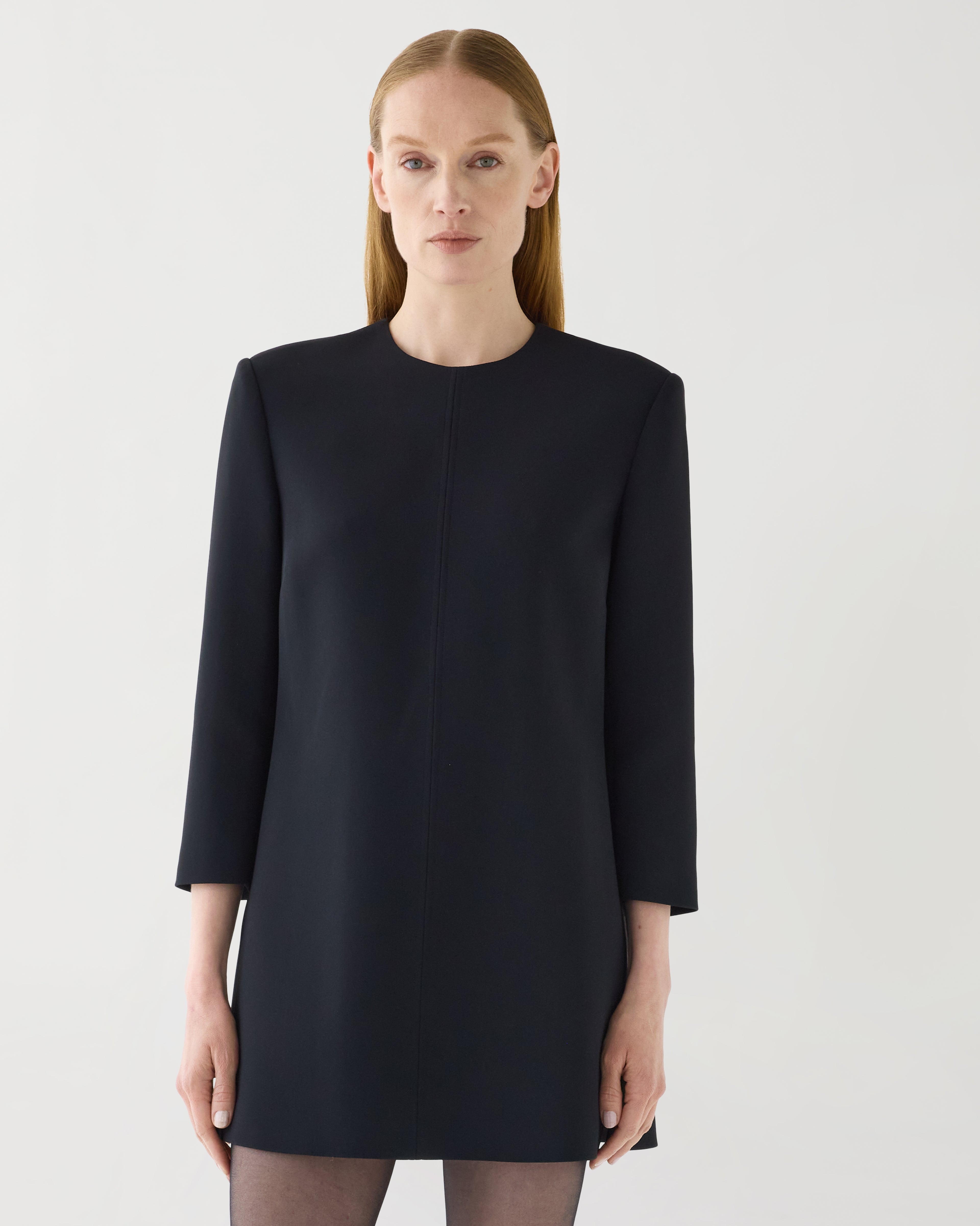 Black Ambar tunic top by Veronica De Piante in stretch viscose crepe, featuring a flowing design and elegant silhouette.