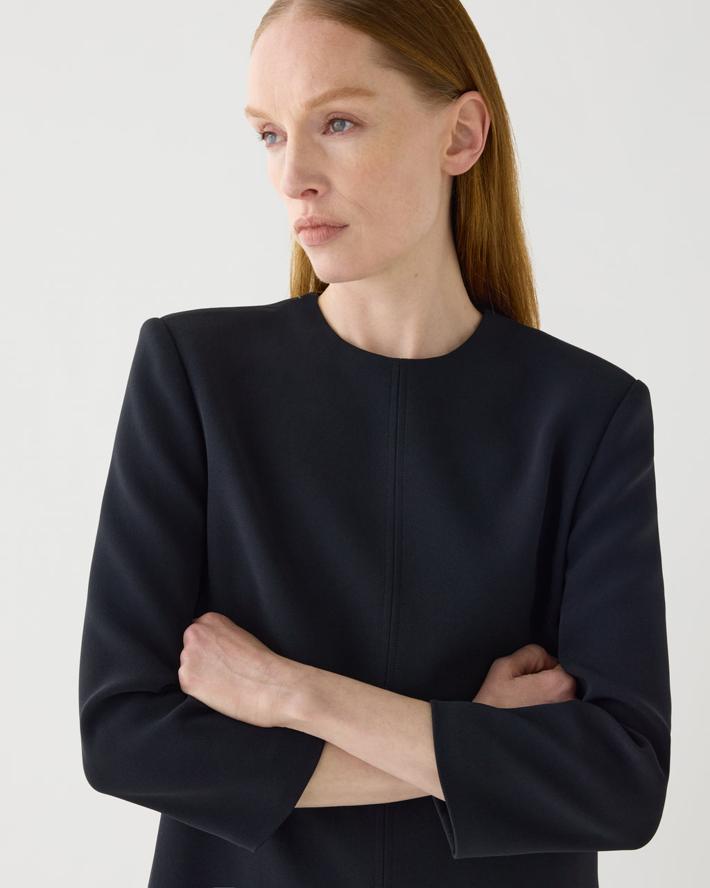 Black Ambar Tunic by Veronica De Piante, made from stretch viscose crepe, showcasing a relaxed fit and elegant drape.