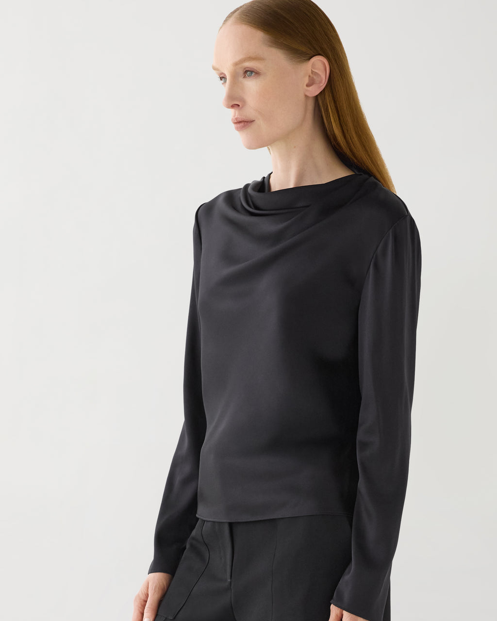 Black stretch silk Cecilia top from SALE, featuring a sleek design and elegant drape, perfect for versatile styling.