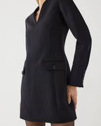 Black Elsie Dress in Grain de Poudre Wool by SALE, showcasing a stylish, fitted dress with long sleeves and elegant design.