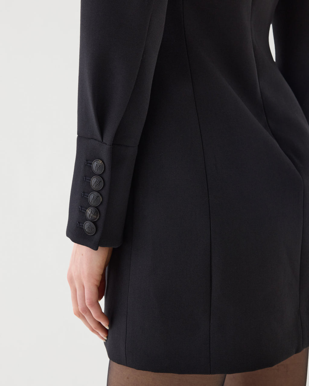 Black Elsie Dress in Grain de Poudre wool by SALE, featuring a stylish, fitted design with long sleeves and elegant silhouette.