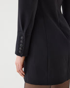 Black Elsie Dress in Grain de Poudre wool by SALE, featuring a stylish, fitted design with long sleeves and elegant silhouette.