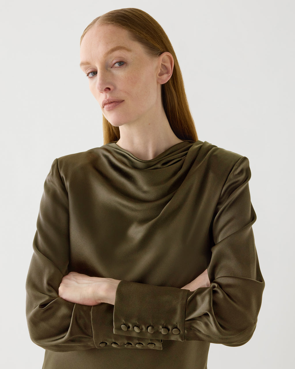 Olive green Amal Dress in stretch silk by Veronica De Piante, flowing design with elegant draping and smooth fabric.