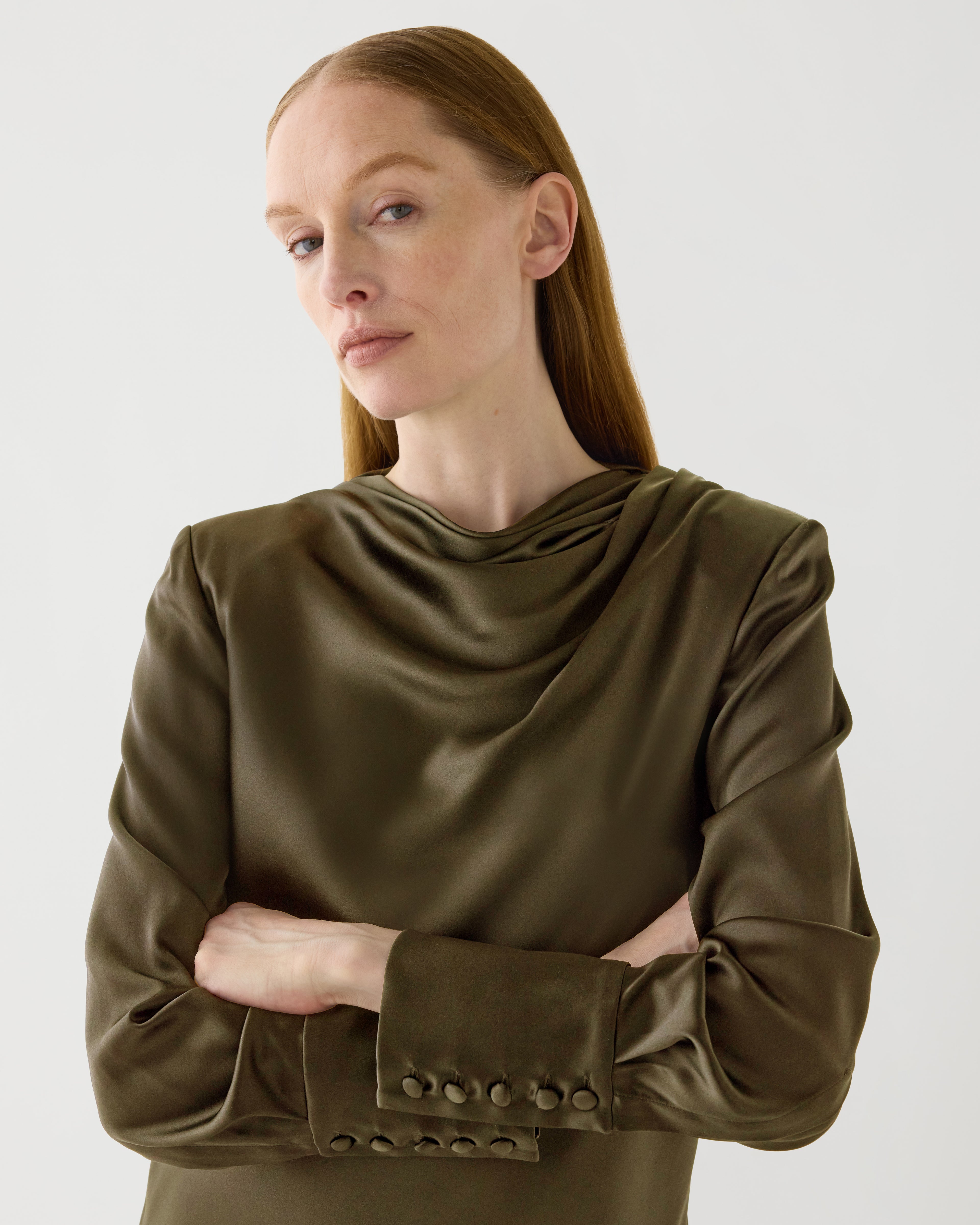 Olive green Amal Dress in stretch silk by Veronica De Piante, flowing design with elegant draping and smooth fabric.