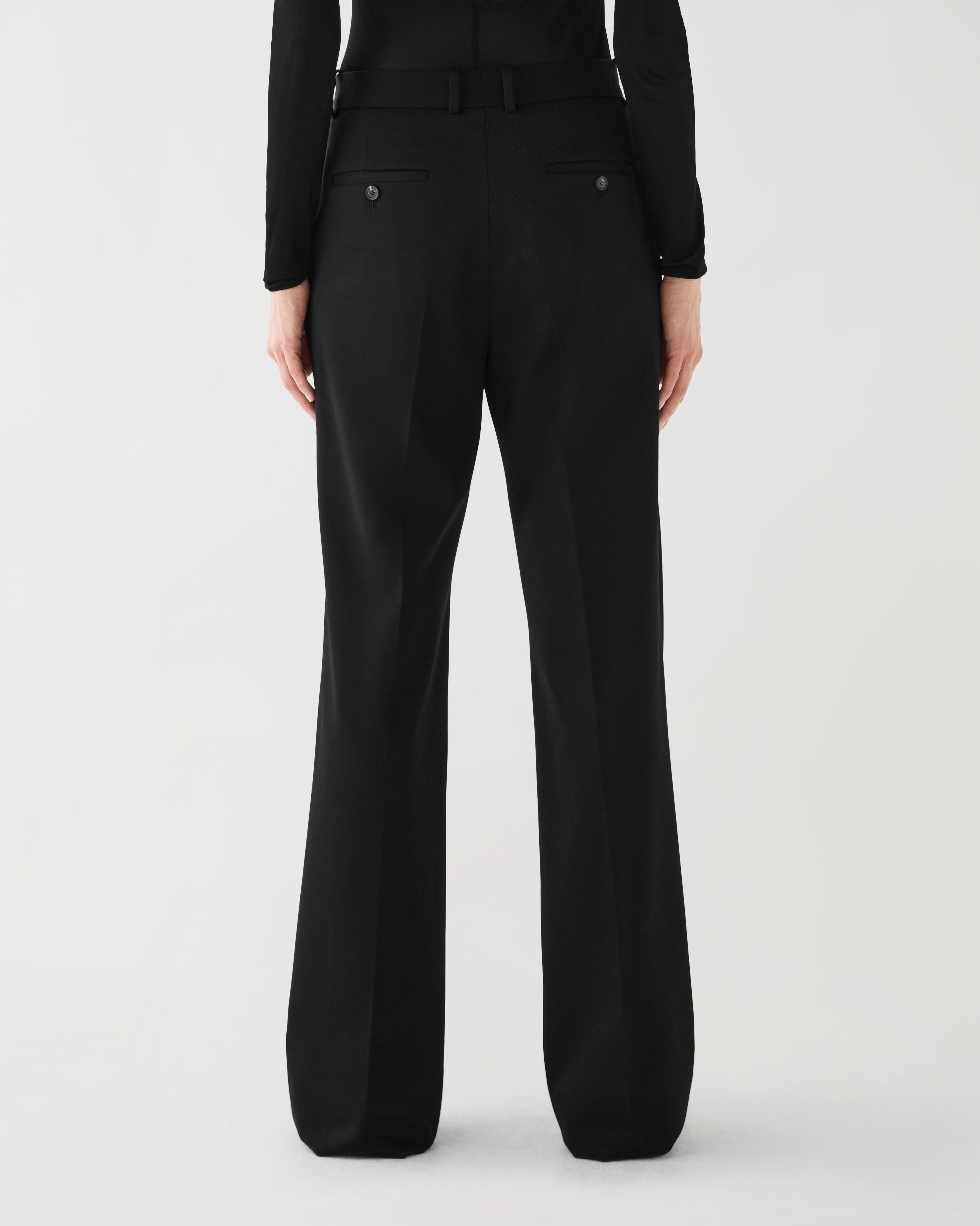 Black Taylor Trouser in stretch wool twill by Veronica De Piante, featuring a tailored fit and classic design for versatile bottoms.