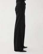 Black Taylor Trouser in stretch wool twill by Veronica De Piante, shown on a hanger with a tailored fit and sleek design.