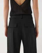 Black Etta trousers in Grain de Poudre wool by Veronica De Piante, featuring a tailored fit and classic style.