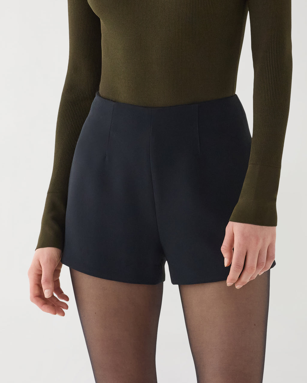 Black Luisa shorts in stretch viscose crepe by Veronica De Piante, showcasing a sleek and stylish design.