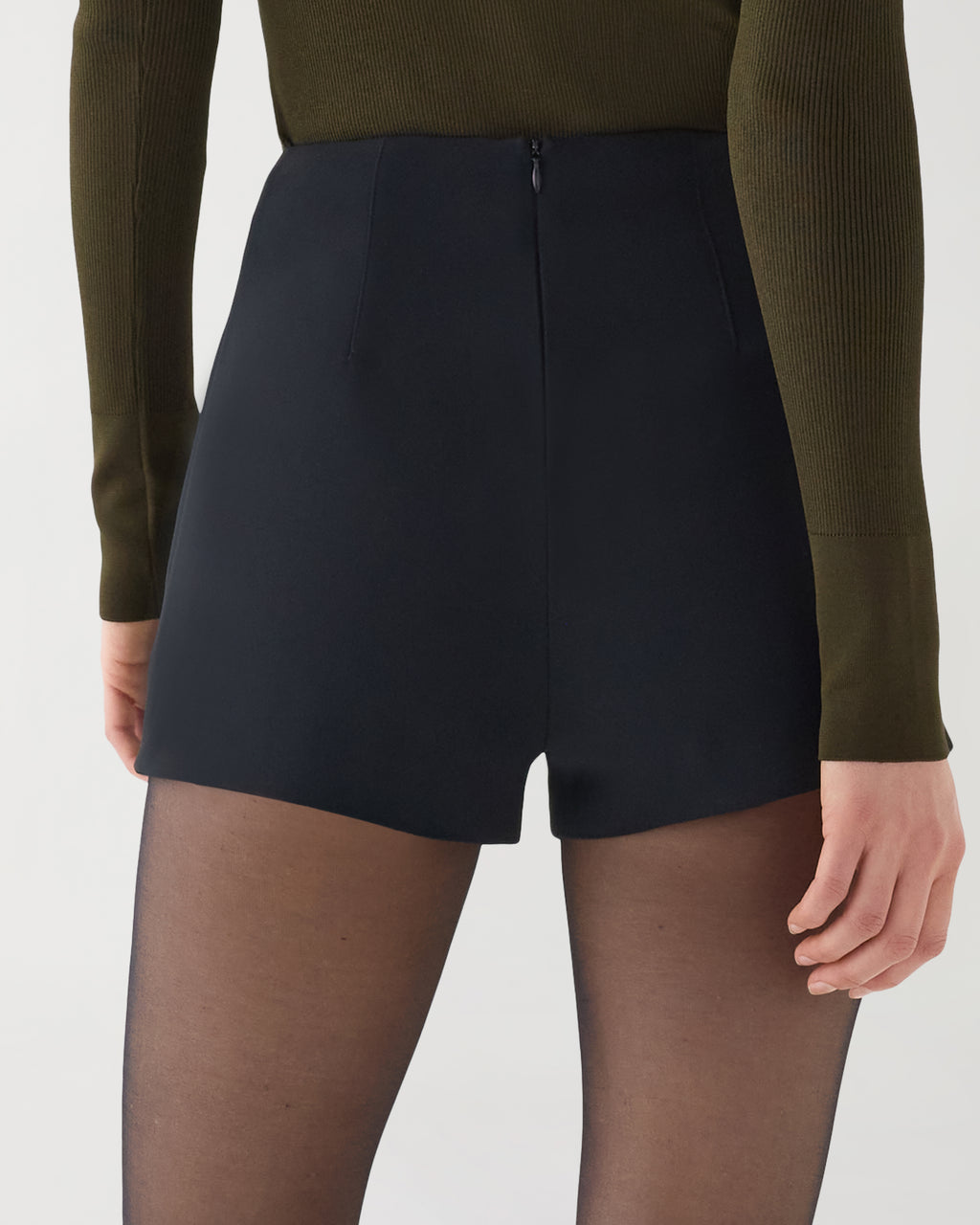 Black Luisa Short in stretch viscose crepe by Veronica De Piante, showcasing a sleek and modern design.