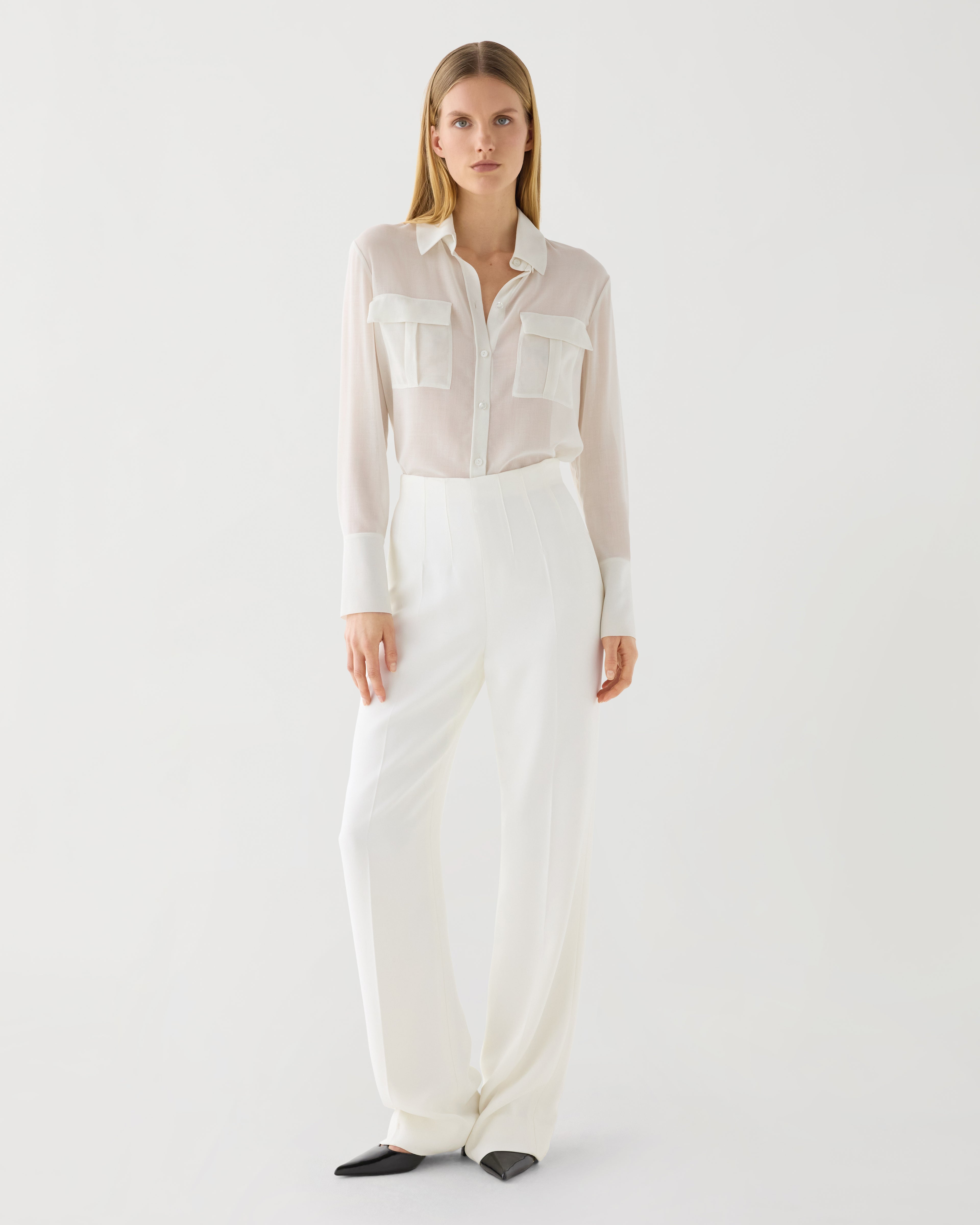 Off-white Naya Trouser in stretch viscose crepe, featuring a sleek design and tailored fit. Perfect for stylish outfits.