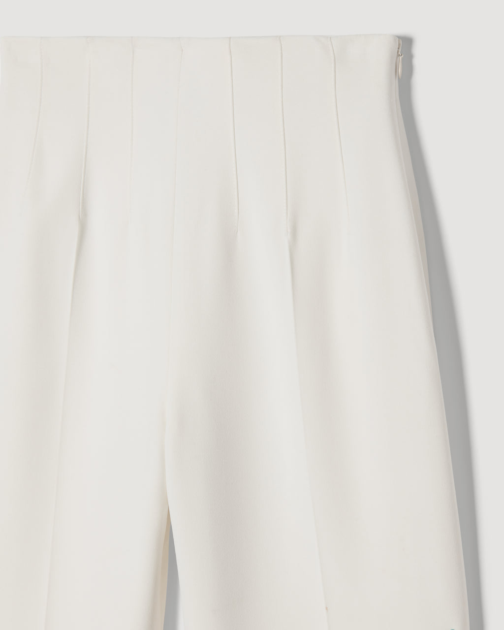 Off-white Naya trousers made of stretch viscose crepe, featuring a sleek and tailored fit for stylish bottoms.