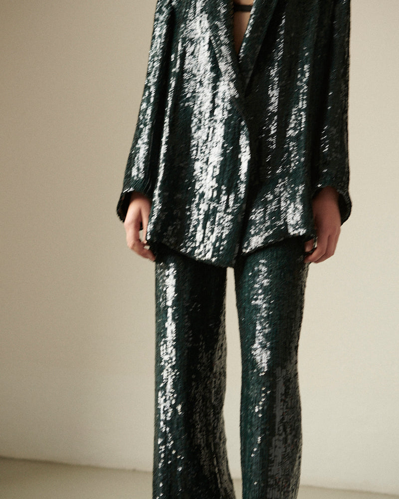 Luxurious emerald green sequin two-piece suit: sparkling blazer and elegant wide-leg trousers