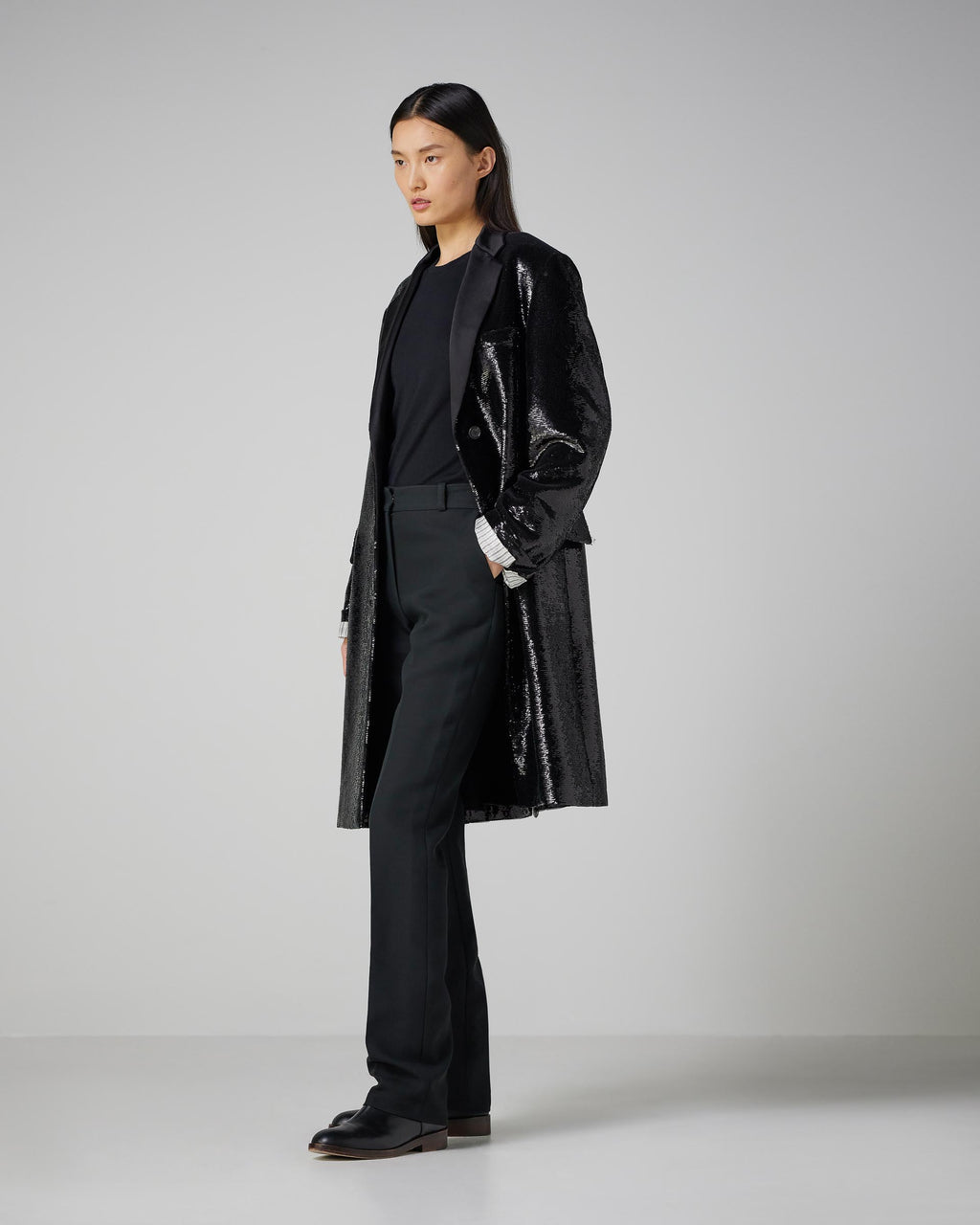 Black Arlo Coat with flat sequins, featuring a stylish design perfect for winter wear.